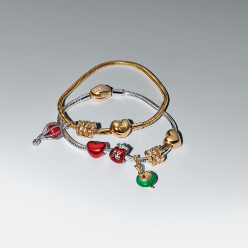 Saritinātas čūskas amulets