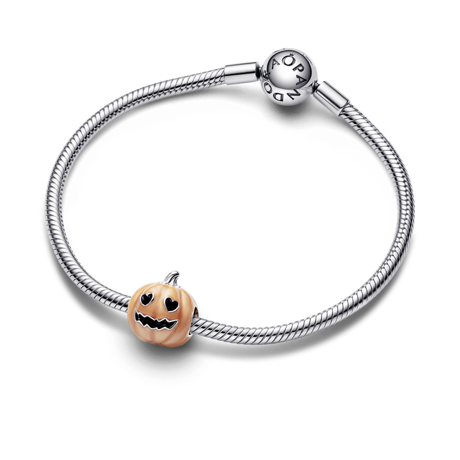 Tumšā mirdzošs, spokains ķirbja amulets