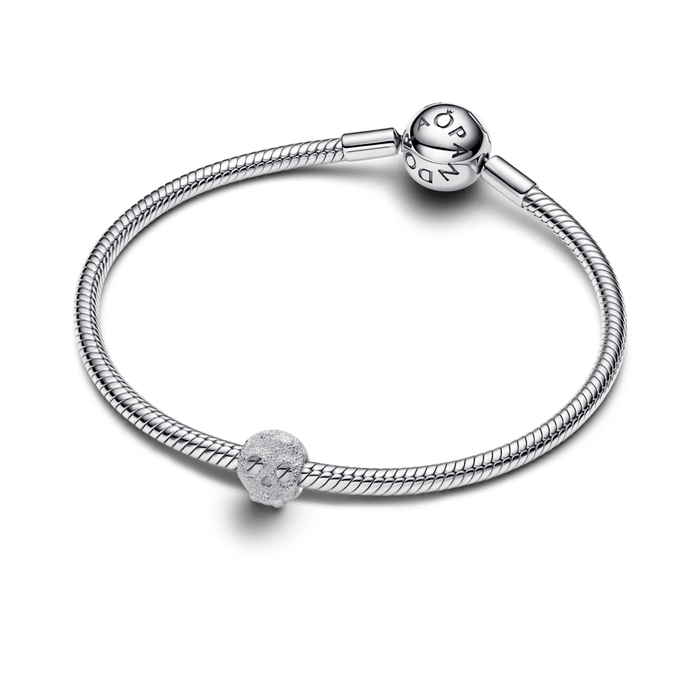 Teksturētais galvaskausa mini amulets