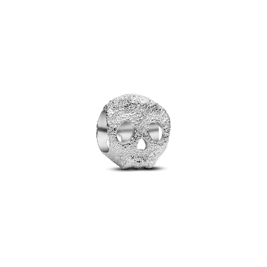 Teksturētais galvaskausa mini amulets