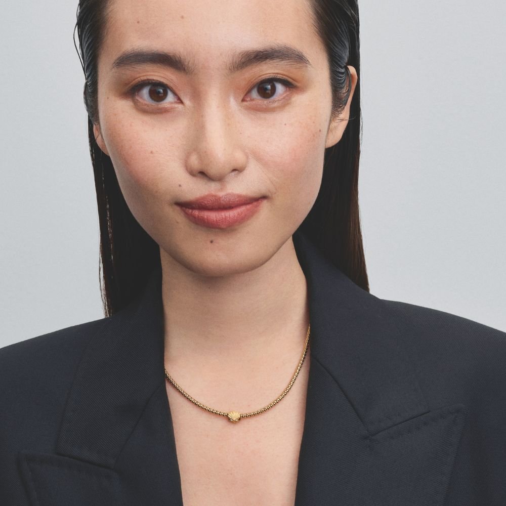 Teksturētais gliemežvāka mini amulets