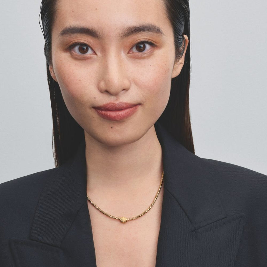 Teksturētais gliemežvāka mini amulets