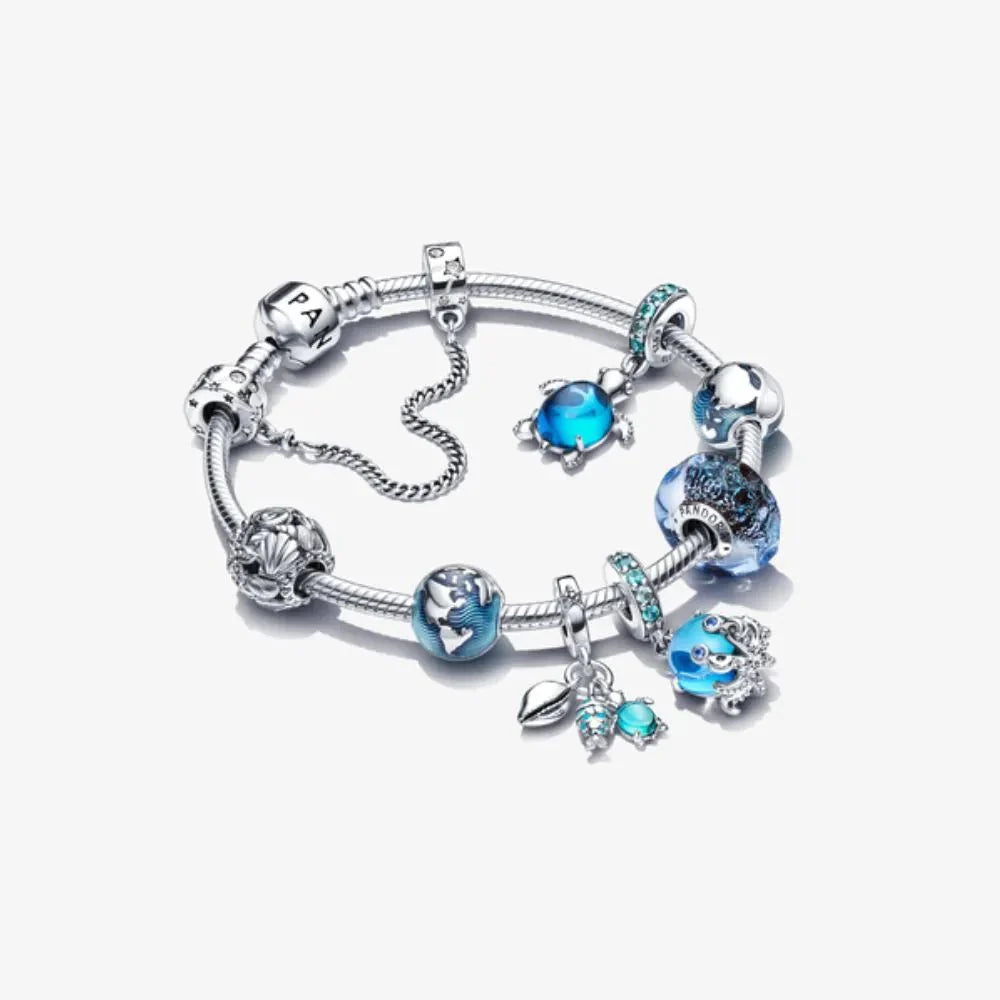 Piespraužams zila globusa amulets