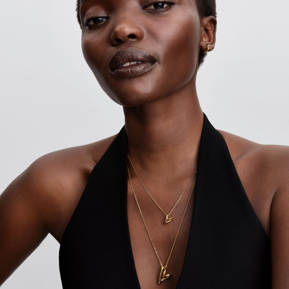 Organiskas formas sirds formas mazā kulona kaklarota