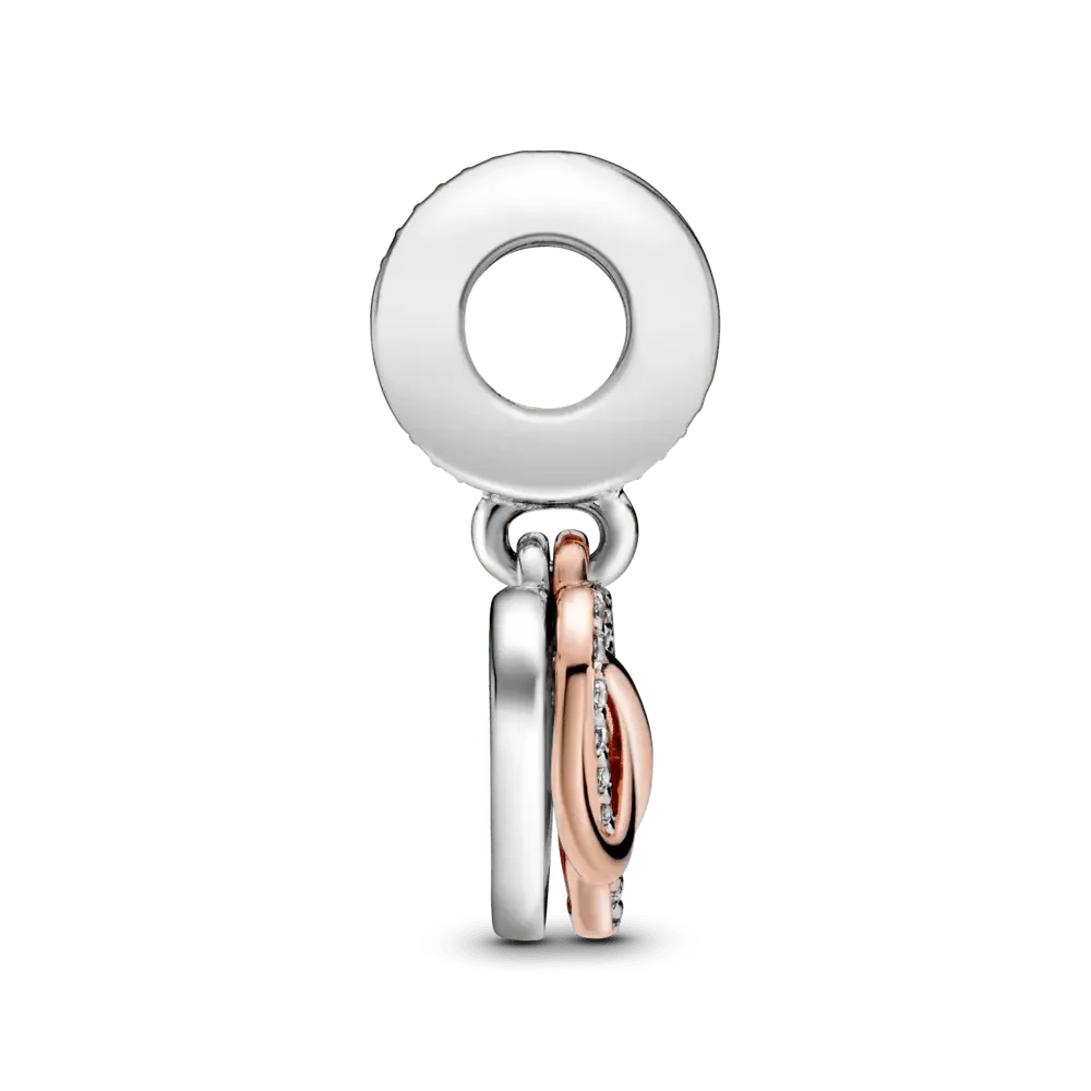 Mirdzošs piekarināmais sirsniņamulets ar bezgalības motīvu