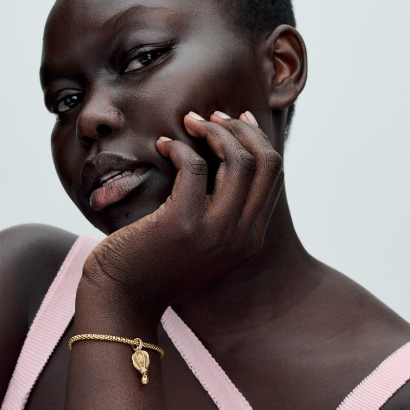 Mirdzoši dzidrā karstā gaisa balona amulets