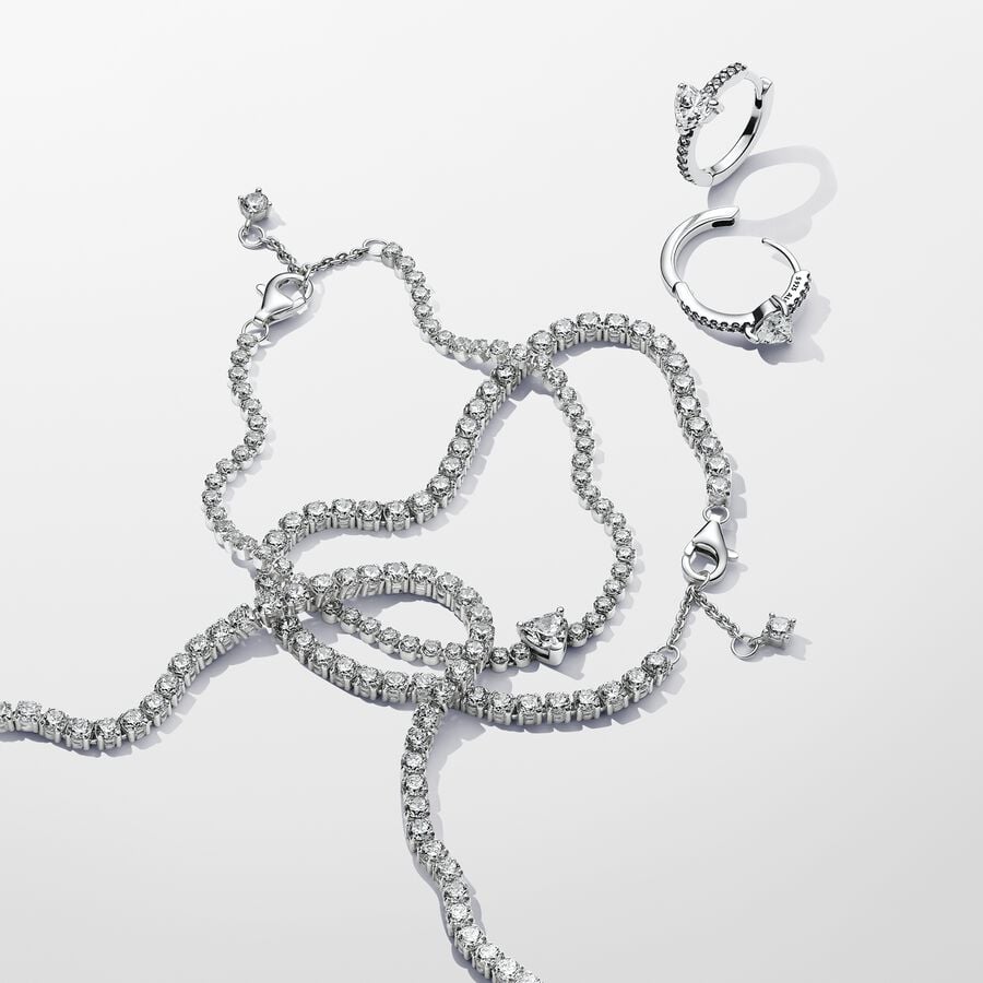 Mirdzoši sirds stīpiņu auskari