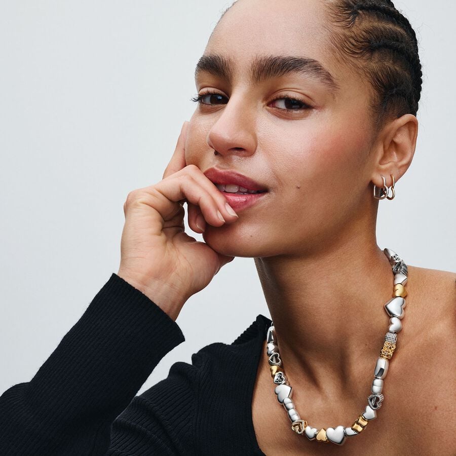 Mirdzošais vienoto sirsniņu amulets