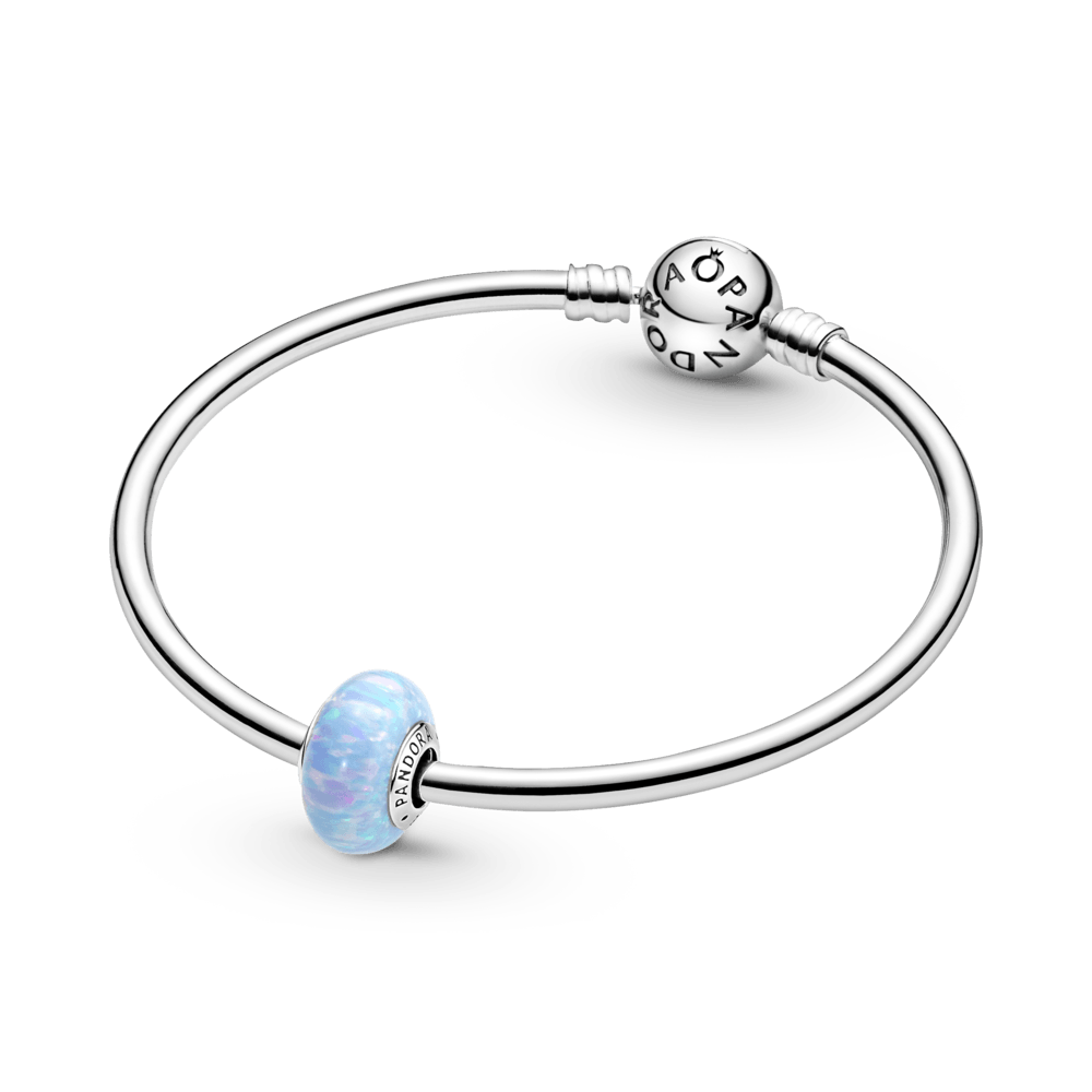 Lāsmojošs okeāna zilais amulets