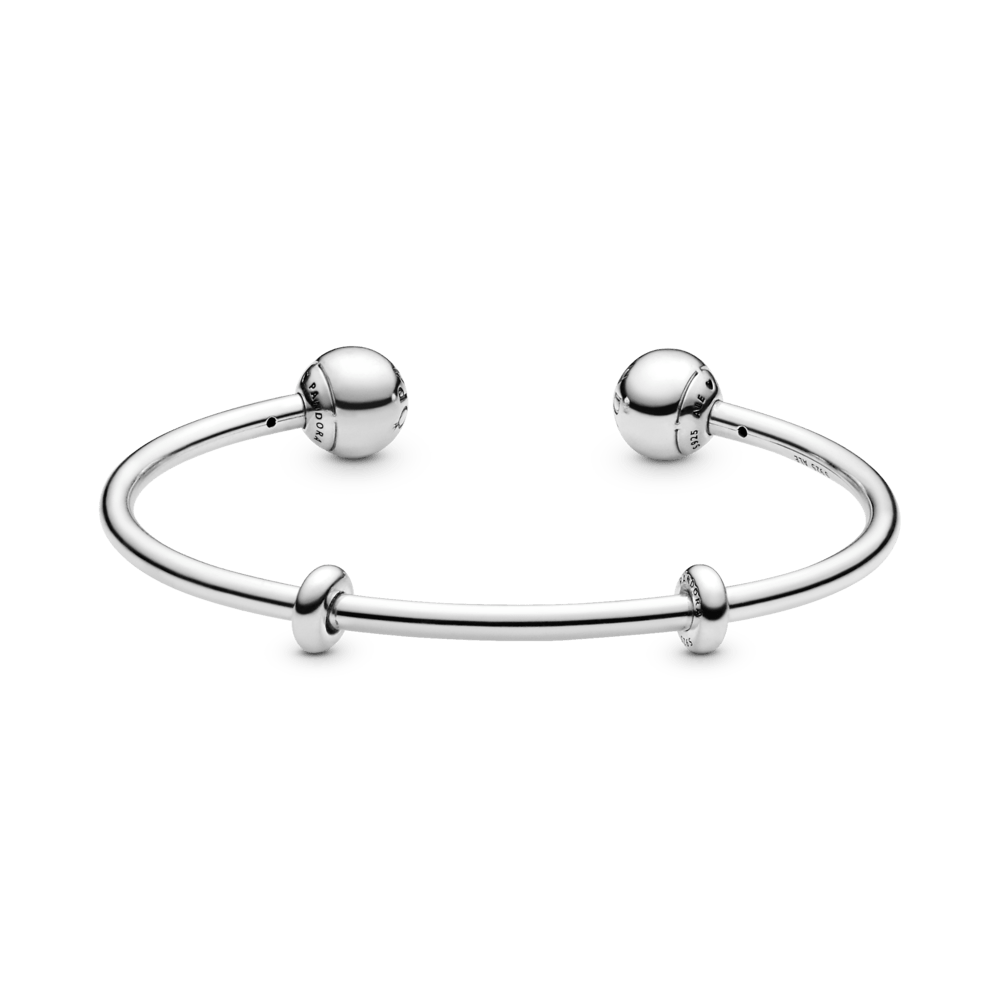 Sudraba atvērta rokassprādze ar silikona aizbāžņiem un maināmiem gala vāciņiem