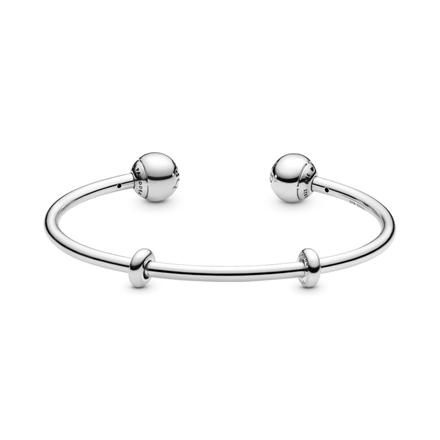 Sudraba atvērta rokassprādze ar silikona aizbāžņiem un maināmiem gala vāciņiem