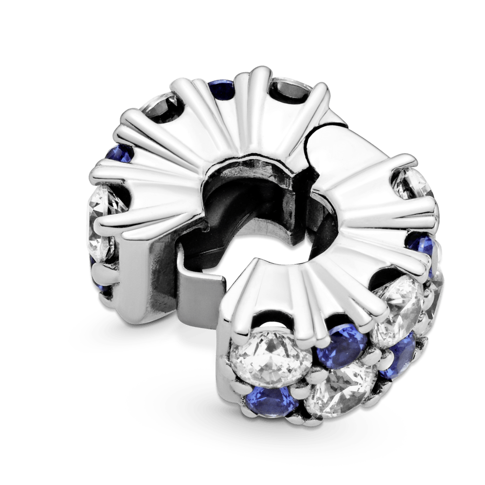 Piespraužamais caurspīdīgi zilais un mirdzošais amulets